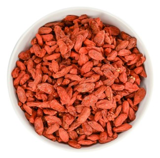Goji Berries (dried) isolated on white background (selective focus, close-up shot)