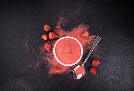 Some Instant Strawberries on a vintage slate slab, selective focus