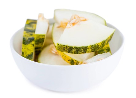 Portion of Futuro Melons (as close-up shot) isolated on white background