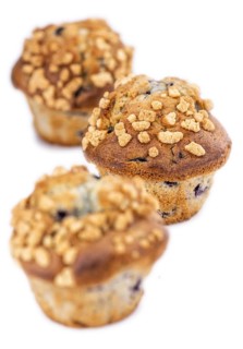 Blueberry Muffins isolated on white background (selective focus, close-up shot)