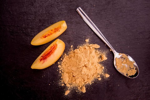 Portion of fresh Ground Peaches close-up shot, selective focus