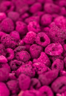 Some homemade Raspberries (dried) as detailed close-up shot, selective focus