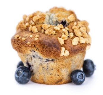 Blueberry Muffins isolated on white background (selective focus, close-up shot)