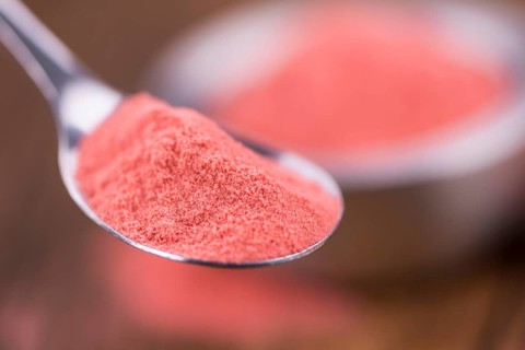 Fresh made Strawberry powder on an old and rustic wooden table, selective focus, close-up shot