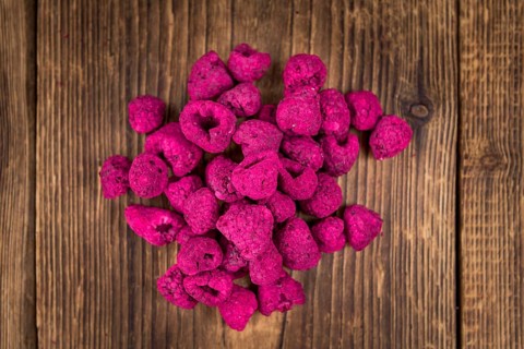 Some homemade Raspberries (dried) as detailed close-up shot, selective focus