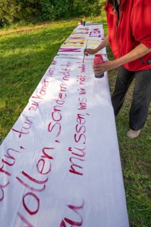 Preparation of banners for the democracy festival to mark 75 years of the Basic Law, Franconia,