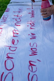 Preparation of banners for the democracy festival to mark 75 years of the Basic Law, Franconia,