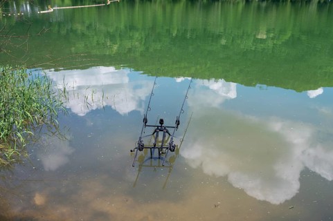 Fishing rod holder with automatic motion detector in a reservoir, Bavaria, Germany, Europe