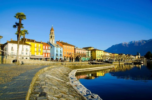 Beautiful City of Ascona on the Waterfront to Lake Maggiore and Mountain in a Sunny Day in Ascona,