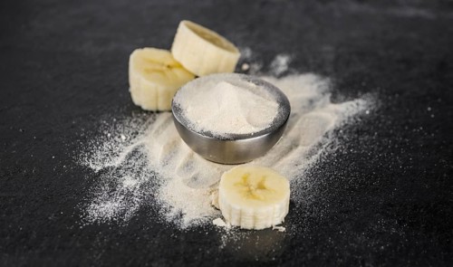 Banana Powder on a vintage background as detailed close-up shot, selective focus