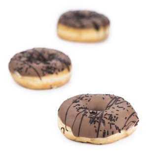 Donuts isolated on white background with a soft shadow (close-up shot)