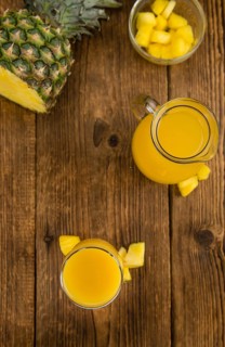 Some homemade Pineapple Juice as detailed close-up shot, selective focus