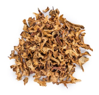 Portion of Dried Chanterelles as detailed close-up shot isolated on white background