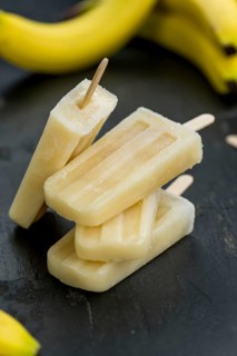 Banana Popsicles on a vintage background (close-up shot, selective focus)