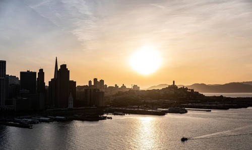 San Francisco Downtown at sunset. View from Oakland Bay Bridge