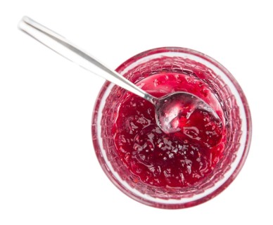 Raspberry Jam isolated on white background, selective focus, close-up shot