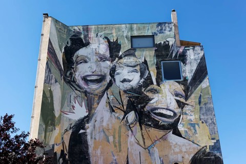 Figure with three different heads, mural by Greek street artist Vasmou, entitled Superman, Psirri