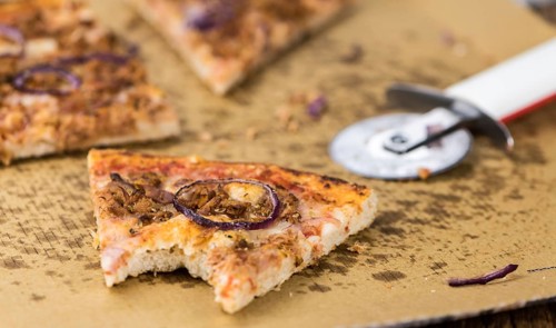Fresh sliced Pizza as detailed close-up shot (selective focus)