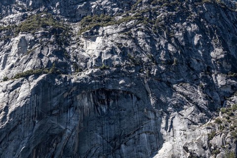 Granite rock face in Yosemite National Park, California. Detailed close-up shot