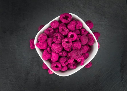 Some homemade Raspberries (dried) as detailed close-up shot, selective focus