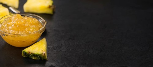 Some homemade Pineapple Jam as detailed close-up shot, selective focus