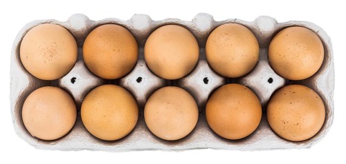 Raw Eggs isolated on white background (selective focus, close-up shot)