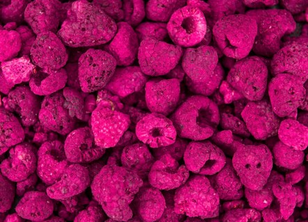 Some homemade Raspberries (dried) as detailed close-up shot, selective focus
