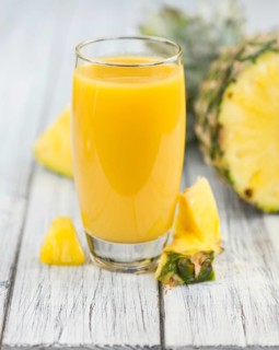 Some homemade Pineapple Juice as detailed close-up shot, selective focus