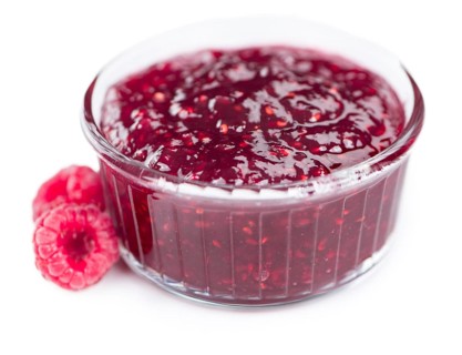 Raspberry Jam isolated on white background, selective focus, close-up shot