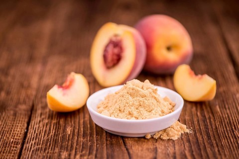 Portion of fresh Ground Peaches close-up shot, selective focus