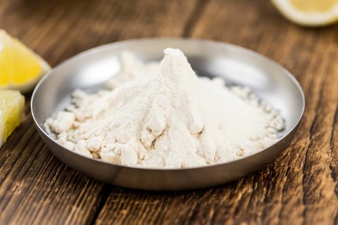 Portion of healthy Lemon powder (selective focus, close-up shot)