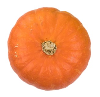 Portion of fesh Pumpkin (close-up shot) isolated on a white background