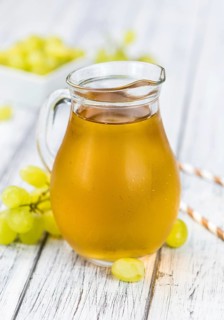 Some healthy Grape Juice (selective focus, close-up shot)