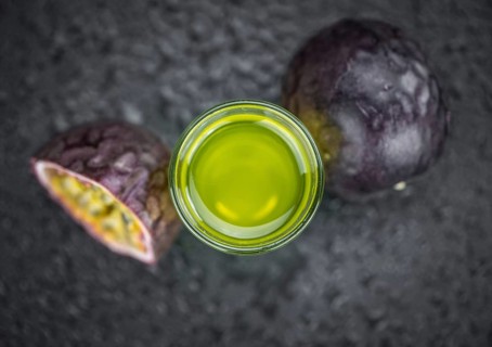 Passion Fruit Liqueur as detailed close-up shot, selective focus