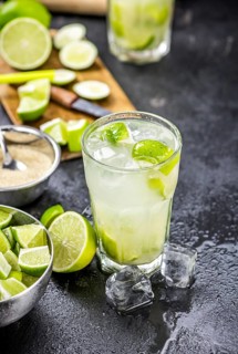 Slate slab with Caipirinha (selective focus, close-up shot)
