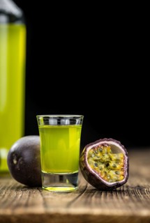 Passion Fruit Liqueur (fresh made) as detailed close-up shot, selective focus