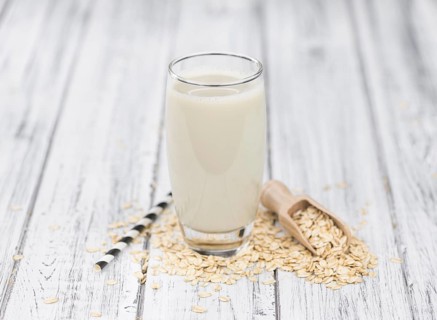 Portion of Oat Milk as detailed close-up shot, selective focus
