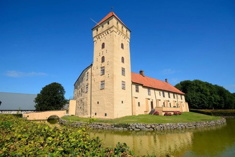 Tosterup castle against blue sky in Tomelilla Municipality, Skane County, Sweden, Scandinavia,