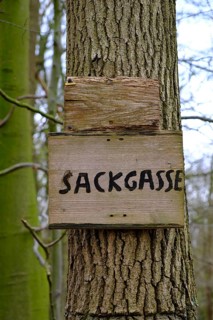 Lettering dead end in a forest, North Rhine-Westphalia, Germany, Europe