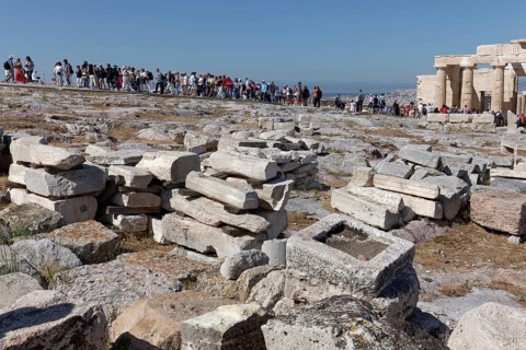 Queue of tourists on the way between Propylaea and Parthenon, in front excavation remains,