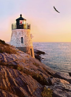Castle Hill Lighthouse at twilight as the sun sets, overlooking Narragansett Bay, Newport, Rhode