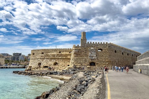 Sea side view from sea harbour entrance to see outer wall of fortress built in medieval times 16th
