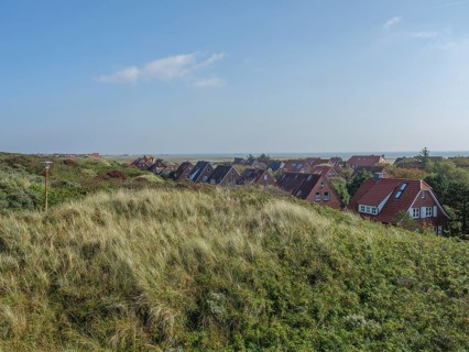 Village on the edge of the dunes with a view of the coast and the sea, juist, east frisia, Germany,