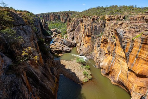 Canyon with steep orange-coloured cliffs with the Blyde River, Bourke's Luck Potholes, Panorama