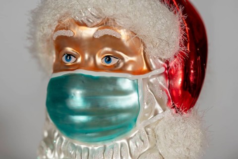 Symbolic image of Christmas in the Corona crisis, Father Christmas figure, Christmas tree
