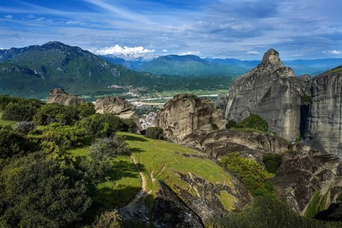 View from the Meteora rocks over the village Kalambaka in the valley to the mountains and