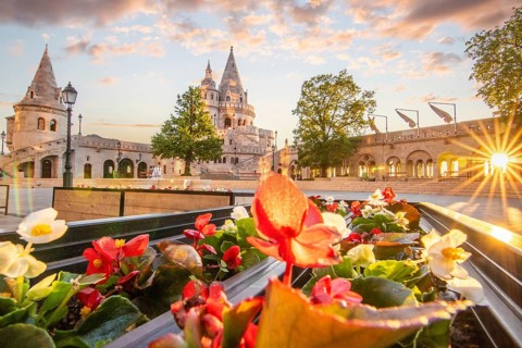 Old historic fortress and church at sunrise. City panorama at dusk. View of the Danube Fishermen's