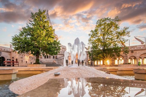 Old historic fortress and church at sunrise. City panorama at dusk. View of the Danube Fishermen's