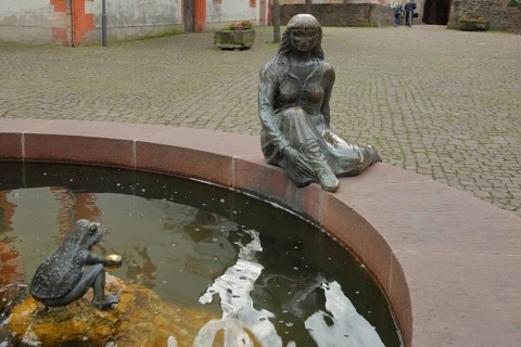 Fairytale fountain with sculptures of the frog king and princess, fairytale, frog figure, fountain,