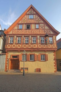 Yellow Öhniger House, red, yellow, half-timbered house, Maingasse, Karlstadt, Bavaria, Germany,